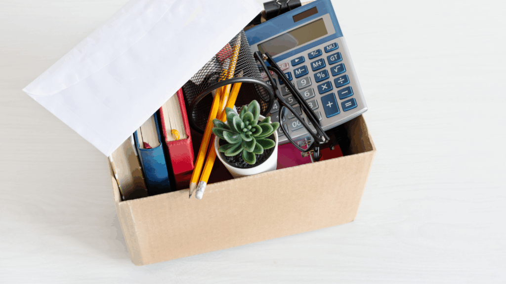 Box filled with office supplies after being fired